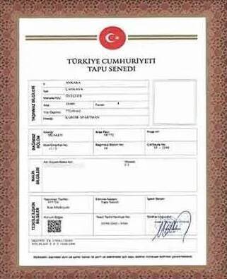 Armalı ve tescil bilgileri içeren Türk Tapu belgesi